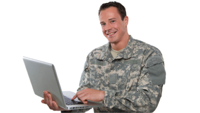 vet holding lap top computer