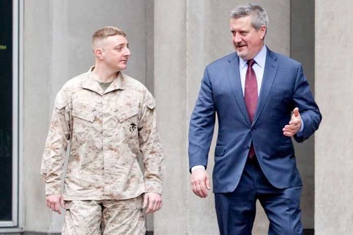 U.S. Marine Corps veteran Brent Jones speaks with American Corporate Partners mentor Joe Vincent